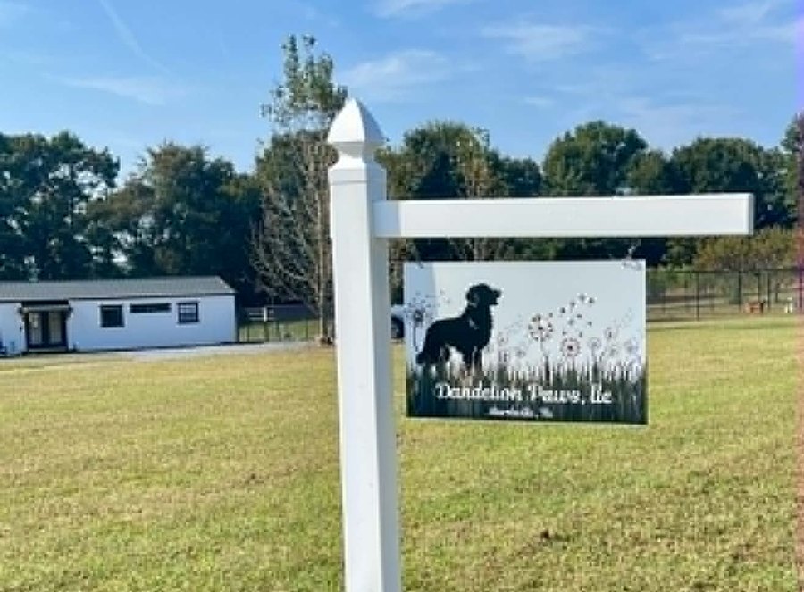 The Dandelion Paws sign at the entrance on SC Helms Road